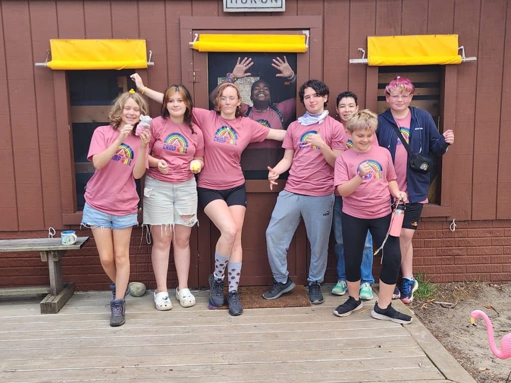 At a summer camp for LGBTQ teens in Traverse Ciity, MI, campers clown around during a photo shoot.