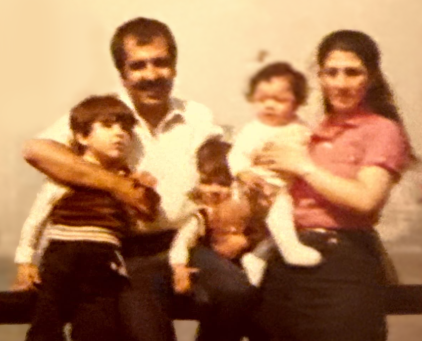 Alemi with his faily as a small child